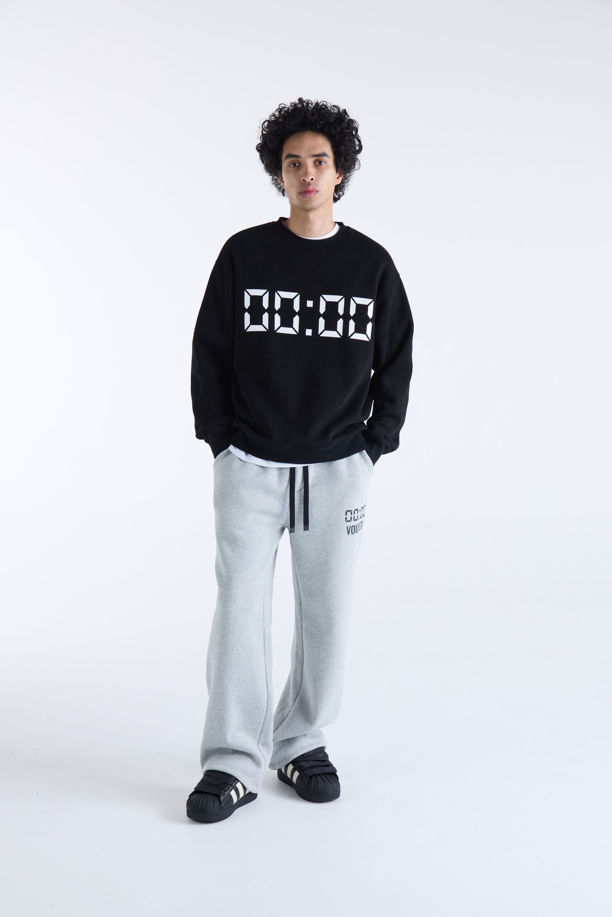 US AGAINST TIME SWEATER - Black