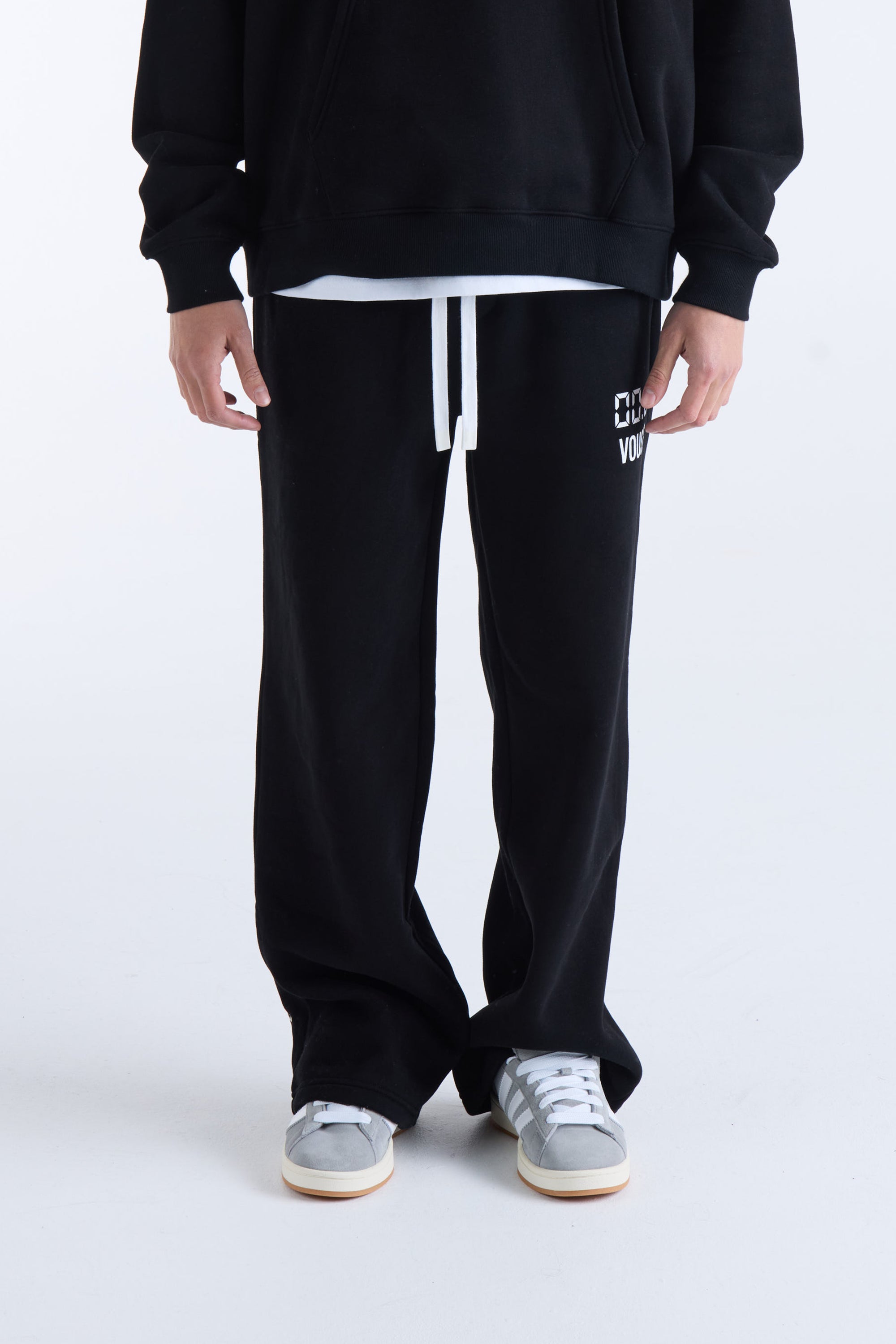US AGAINST TIME TRACKPANTS - Black