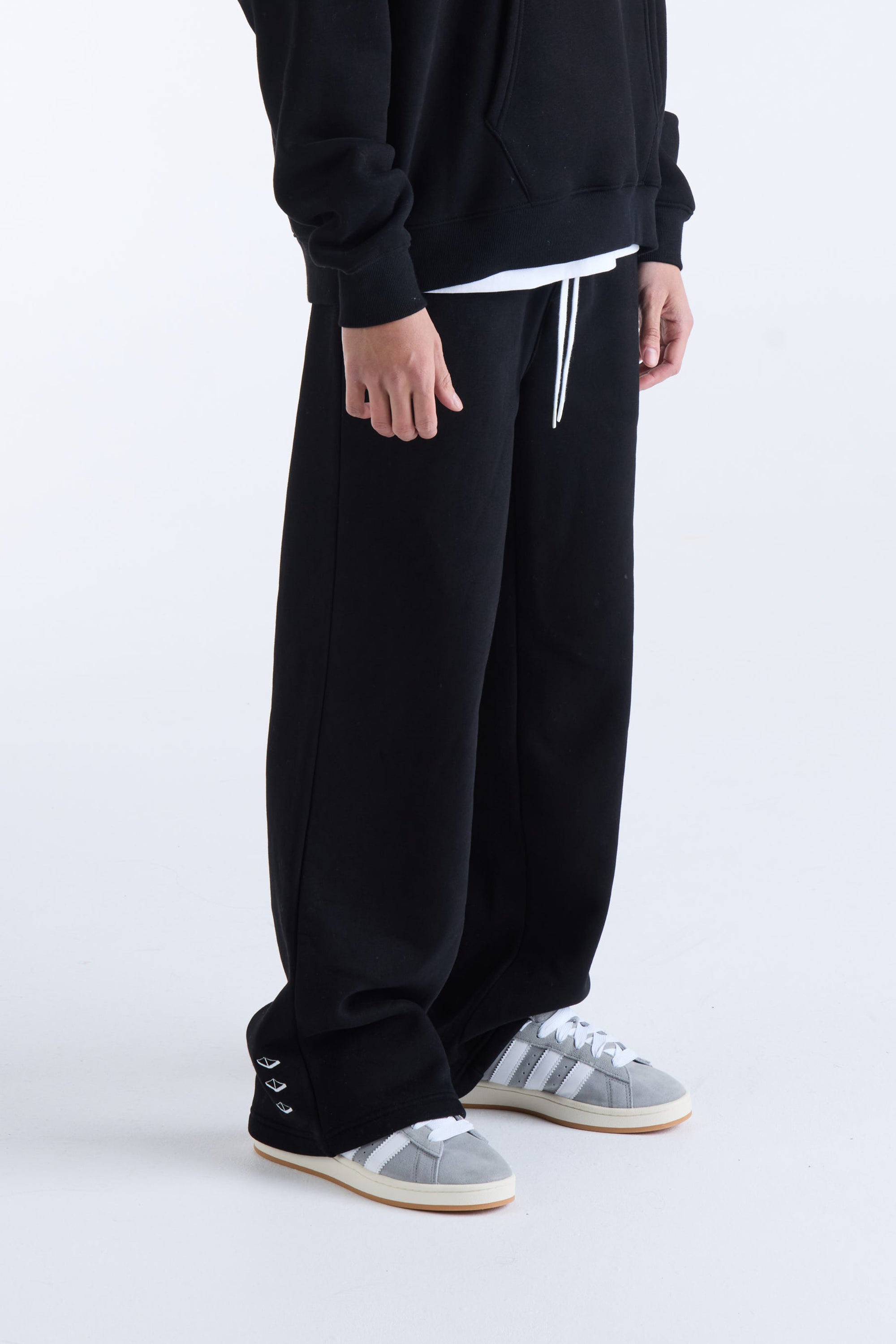 US AGAINST TIME TRACKPANTS - Black