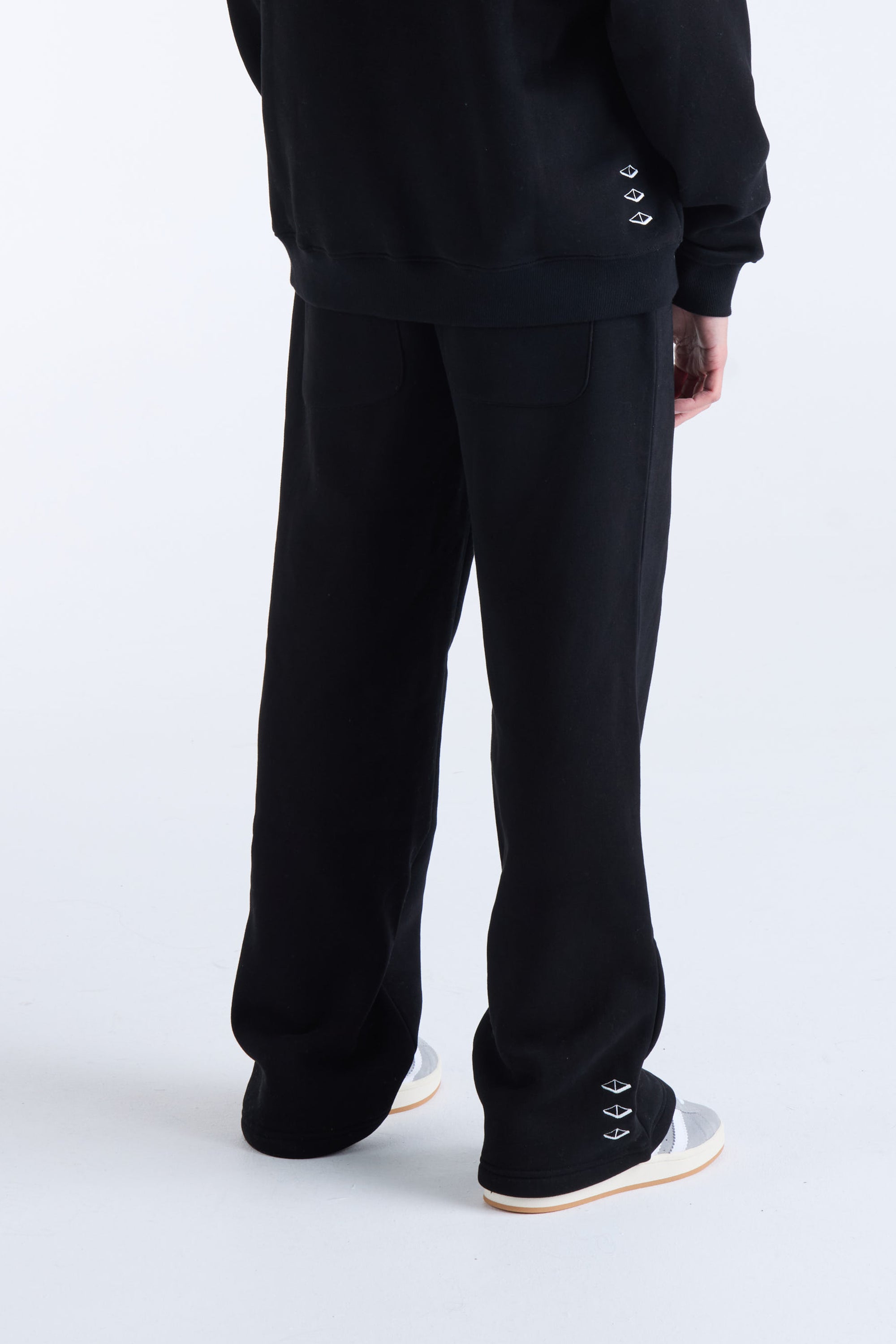US AGAINST TIME TRACKPANTS - Black
