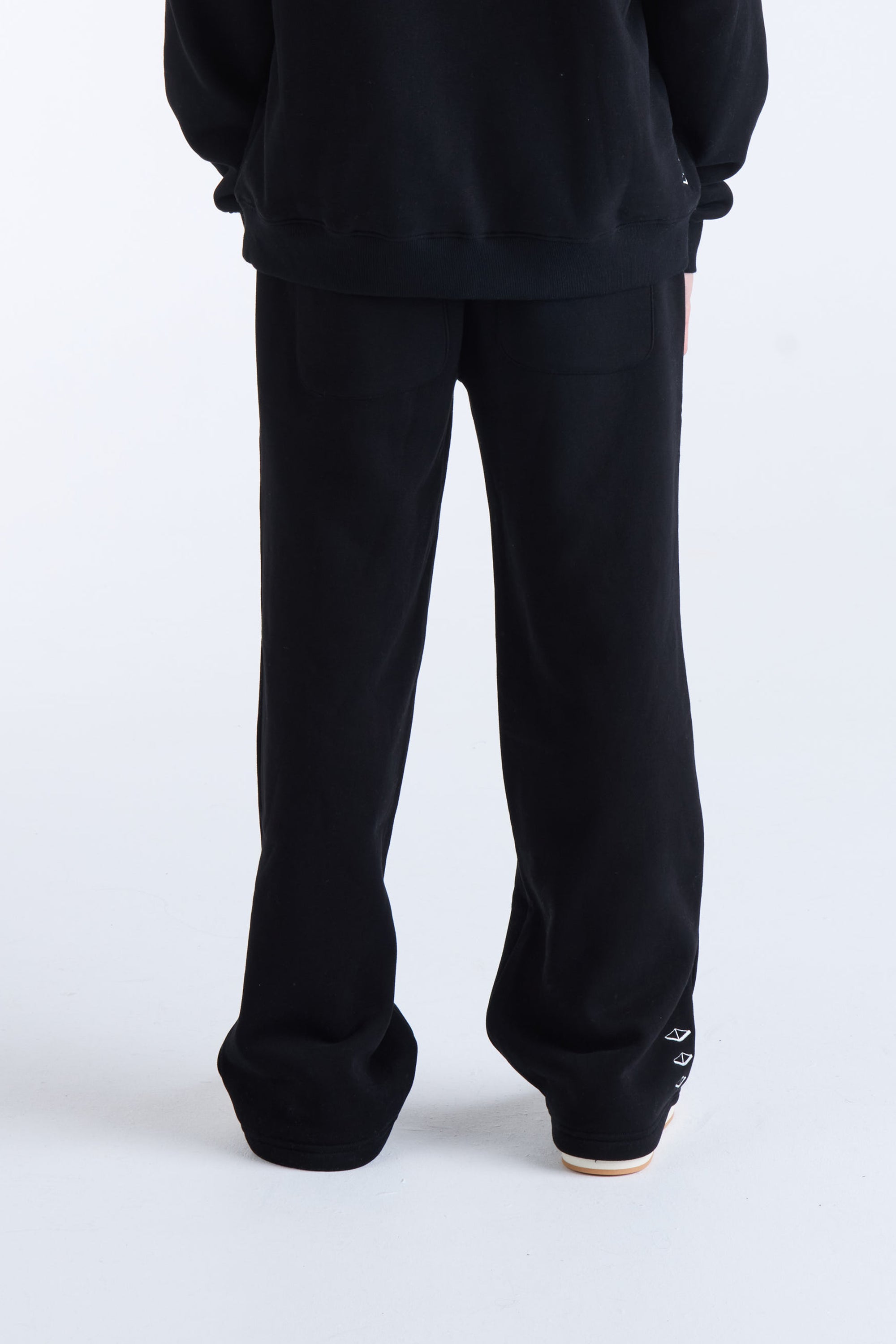 US AGAINST TIME TRACKPANTS - Black